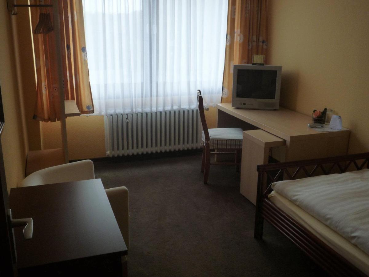 Center Hotel Гютерсло Номер фото